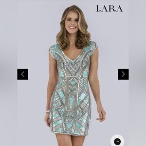 Beaded Turquoise Cocktail dress 
Lara Design